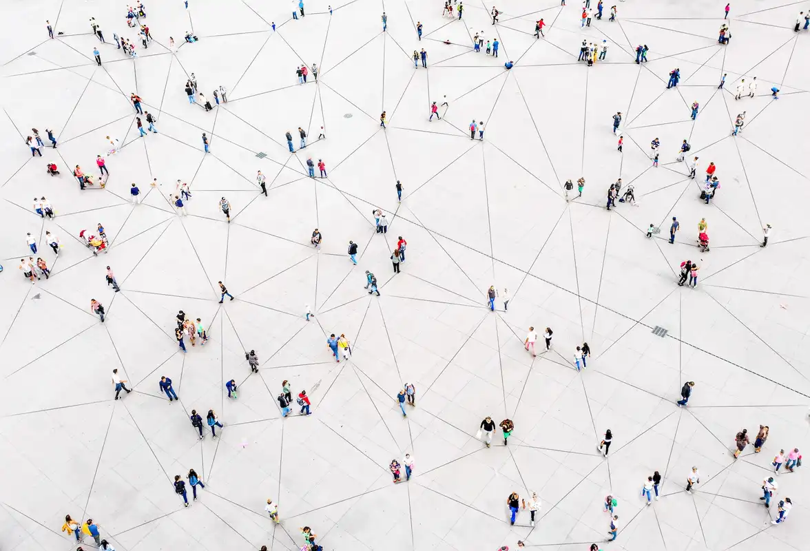 An image of humans connected together with data like strings